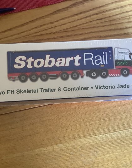 STOBART Volvo FH Skeletal Trailer & Container • Victoria Jade • H4941 Atlas Editions